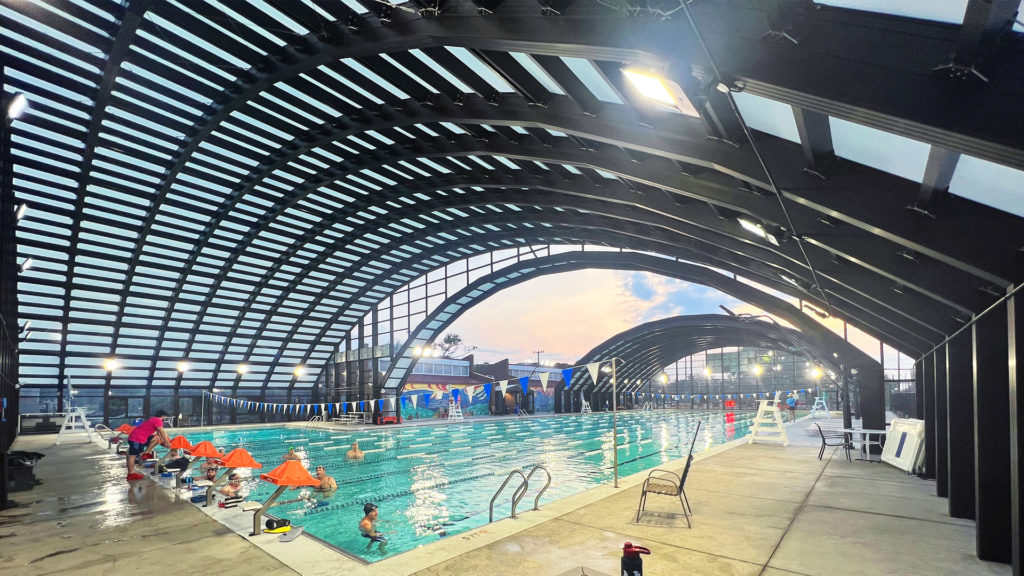 DynaDome | An indoor swimming pool with a retractable enclosure.