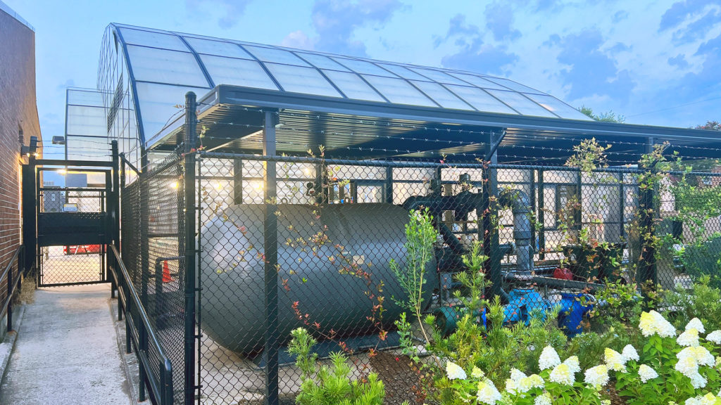 DynaDome | A retractable greenhouse with a water tank.