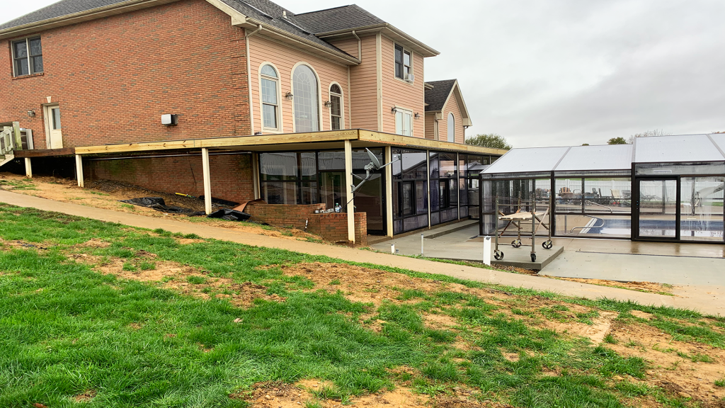 DynaDome | A house with a retractable pool enclosure.