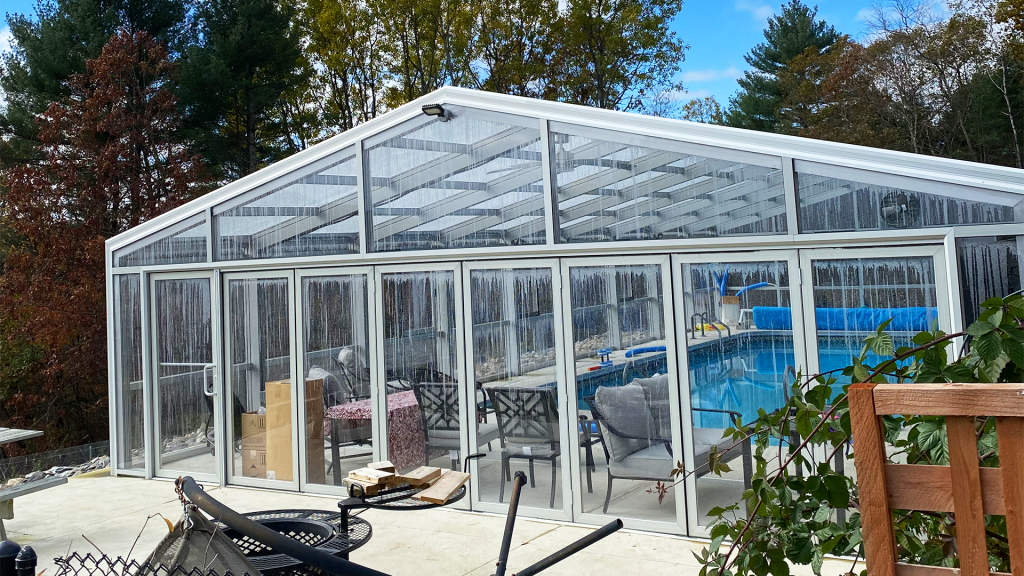 DynaDome | A retractable glasshouse with a pool in the backyard.