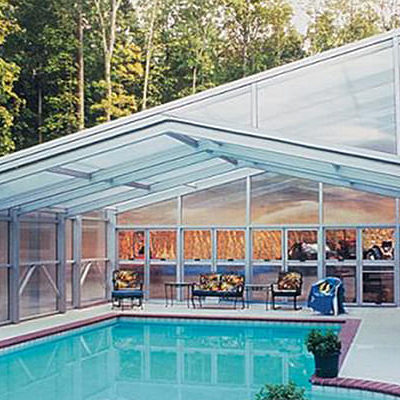 DynaDome | A glass-enclosed swimming pool, creating a luxurious oasis within the comfort of your home.